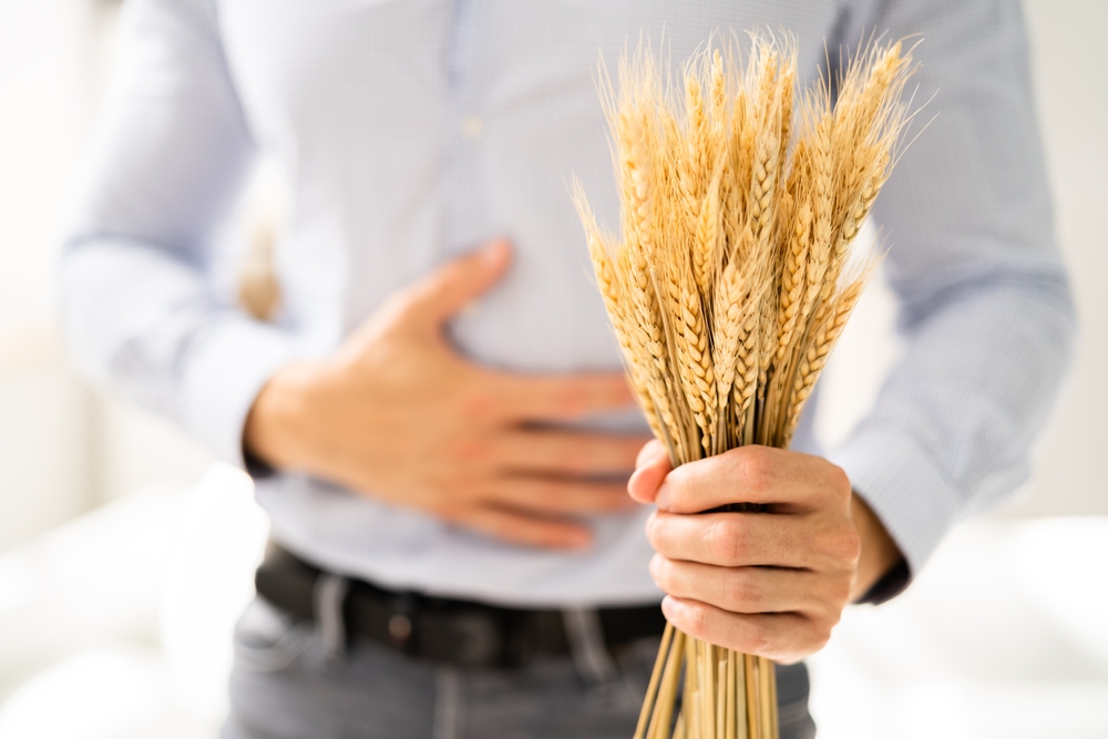 Celiac,Disease,And,Gluten,Intolerance.,Women,Holding,Spikelet,Of,Wheat